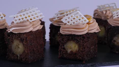 chocolate banana cakes with whipped cream and caramel sauce