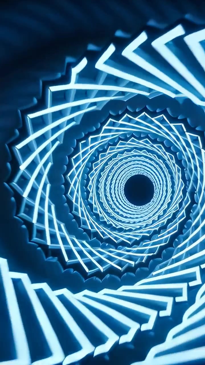 Video verticale: Lamelle a spirale rotanti avanzano in un vuoto centrale in un tunnel per la messa a fuoco.