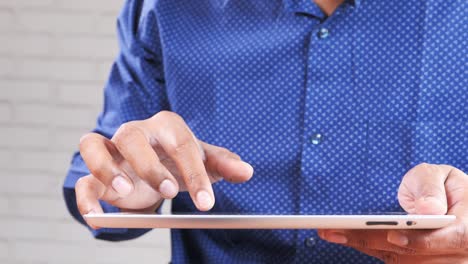 man using tablet