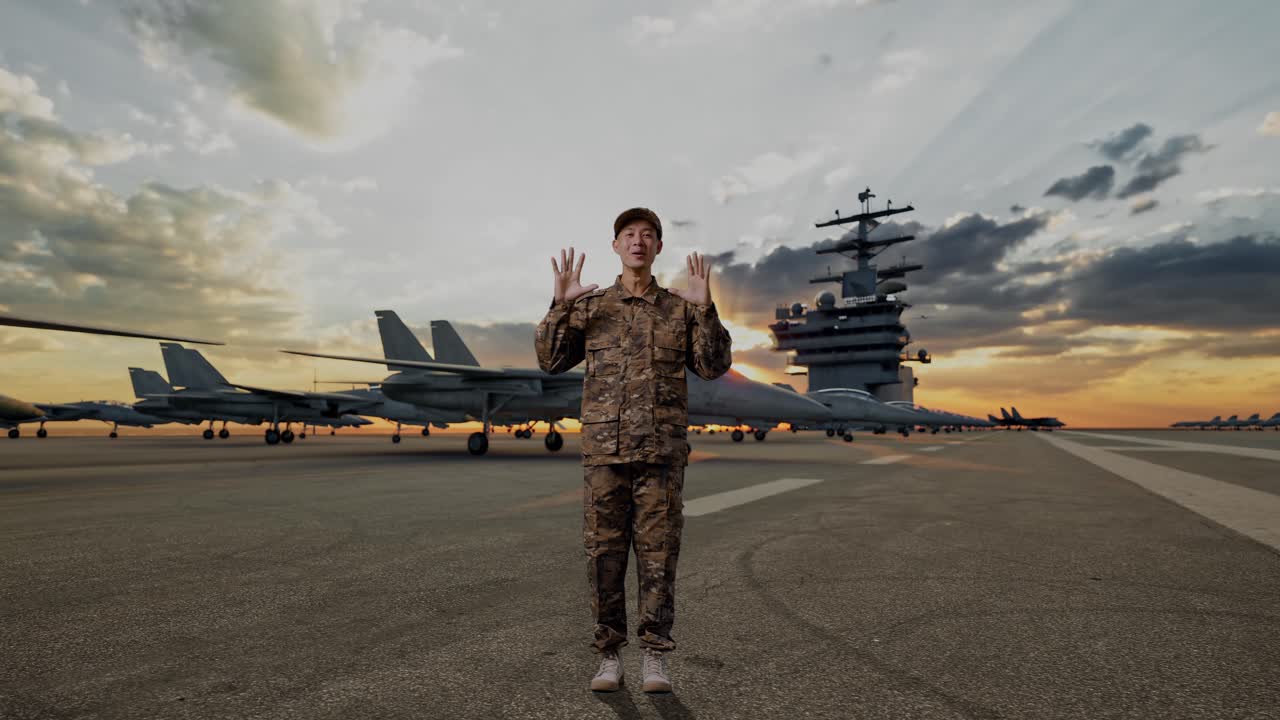 Military personnel on aircraft carrier deck at sunset