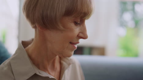 Closeup-senior-woman-talking-at-home.-Portrait-of-older-lady-waving-head-yes