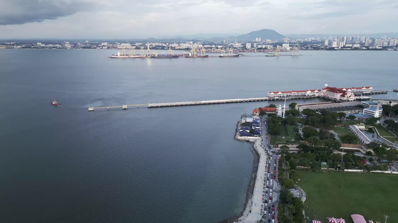 Aerial of George Town Penang island Malaysia port fast ferry connection to Butterworth Malay peninsula drone