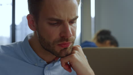 Businessman-working-in-open-space.-Male-manager-thinking-about-project