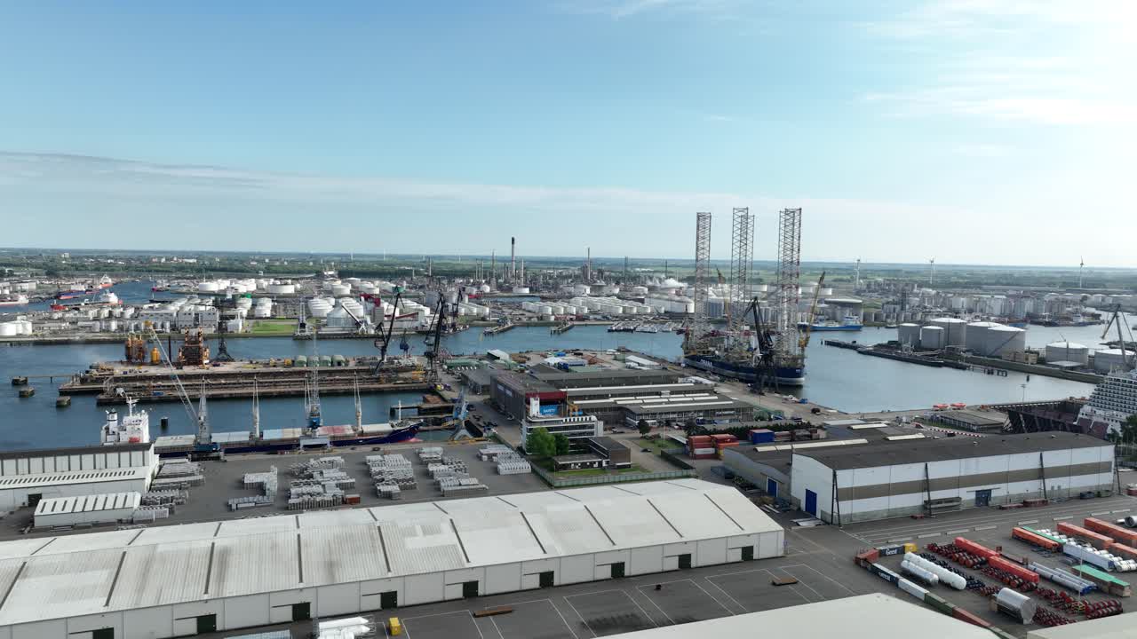 Industrial port of Rotterdam, heavy industry, shipping, waterways, trade, sea connection. Aerial view.