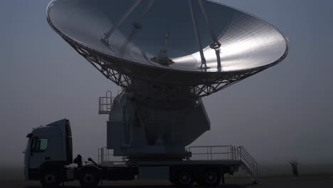 large satellite dish on a truck