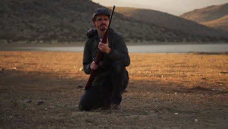 Professional-rifle-shooter-firing-a-round-at-Lucerne-Valley-California-in-slow-motion