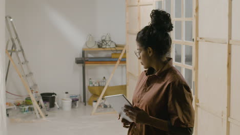 woman using tablet in the studio