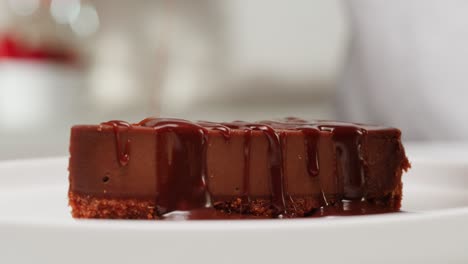 chocolate cake slice with drizzled chocolate