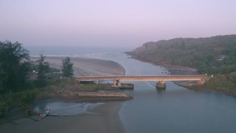 sea side bridge and an aerial view of the beach