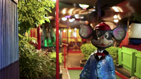 nighttime mini golf with mouse character