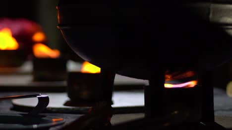 Close-up-shot-of-a-potjie-pot-on-flames