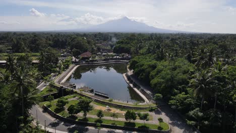 beautiful aerial view of mororejo reservoir, a reservoir located in tempel, sleman regency, yogyakarta. as irrigation and village park.