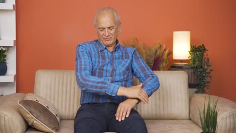 old man relaxing by self-massage.