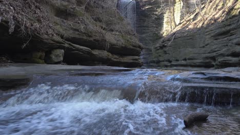 forest valley waterfall and mountain river cascading down steps