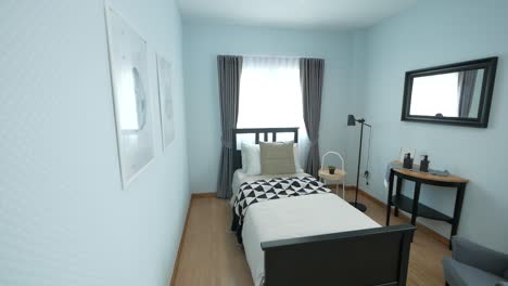 cosy black and white bedrrom with single bed decorated with stylish furnitures