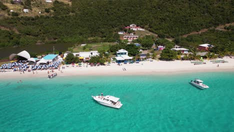 tropical paradise of british virgin islands, aerial view of white sand beach and turquoise sea, revealing drone shot