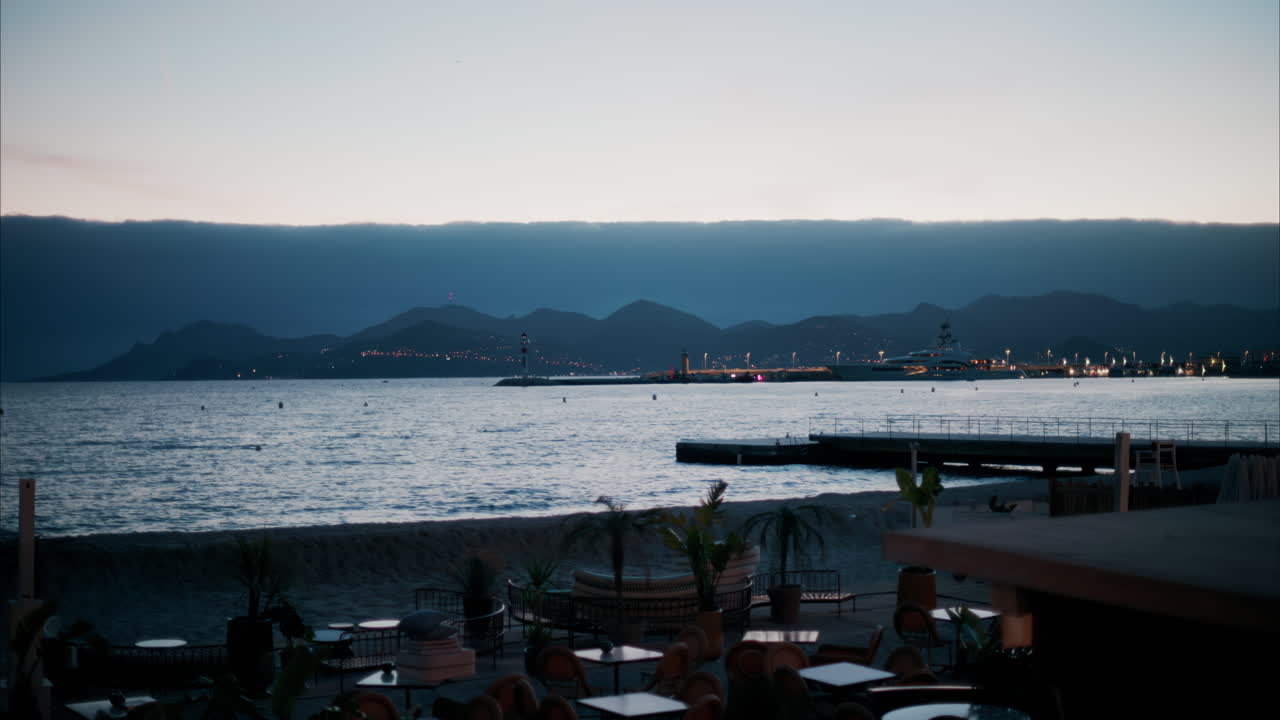View of a beach and the sea in Cannes, France in the evening