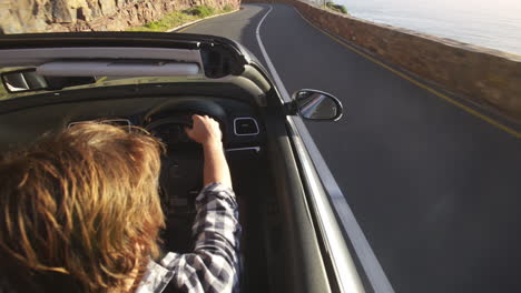 Couple-driving-convertible-car-cabriolet-cape-town-south-africa-steadicam-shot