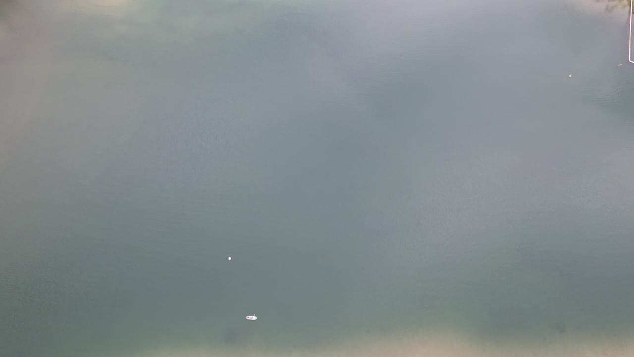 Tilt-up Reveal Of Tallebudgera Creek Bridge And Coral Sea In Burleigh Heads, Queensland, Australia. aerial shot