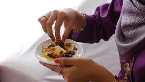 dipping food in the plate