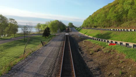 Train Passing Through Scenic River Valley