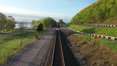 train passing through scenic river valley