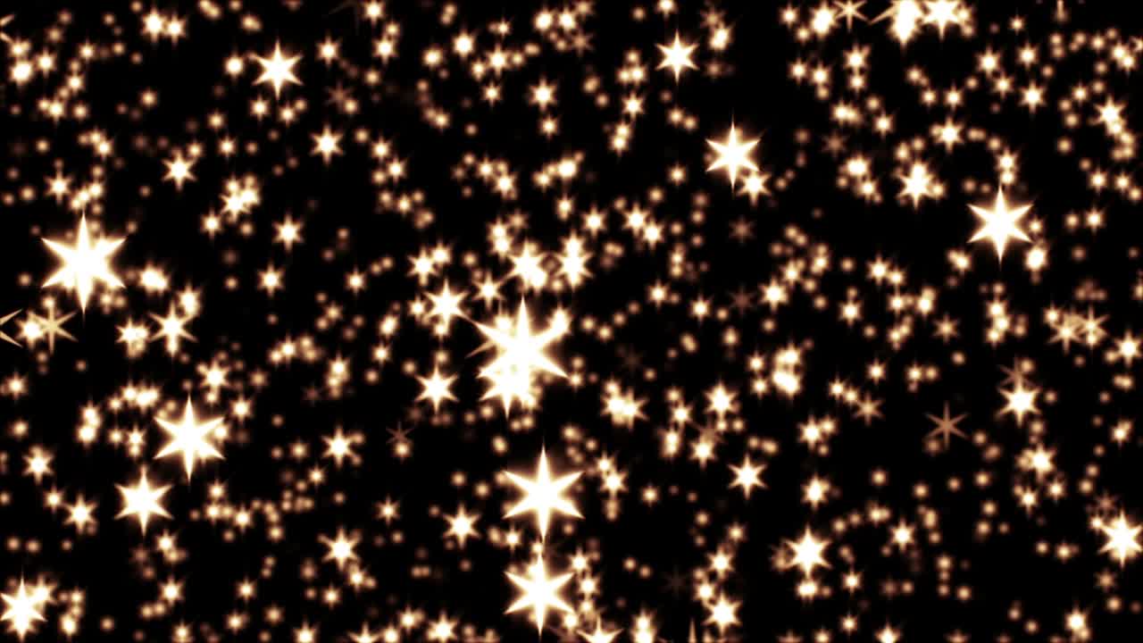 fondo con partículas de brillo dorado que caen