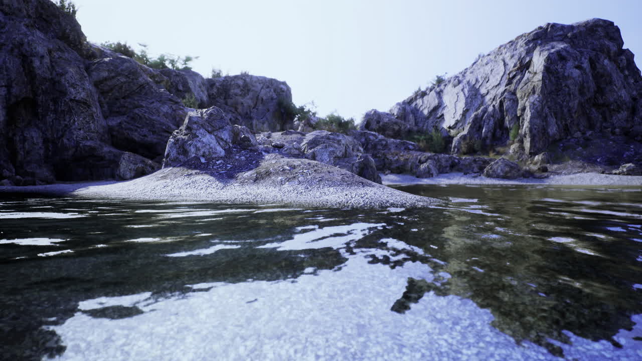 Natures serene waters reflect rocky cliffs in a peaceful setting
