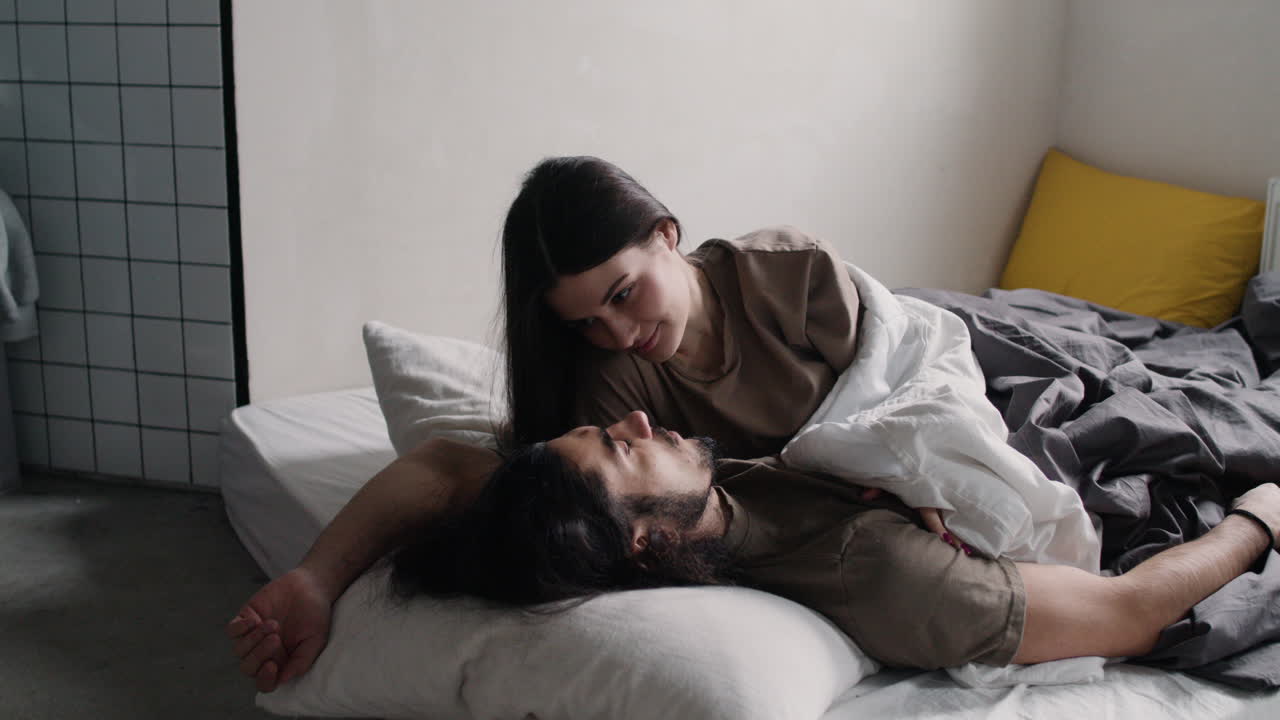 Couple in love in bed