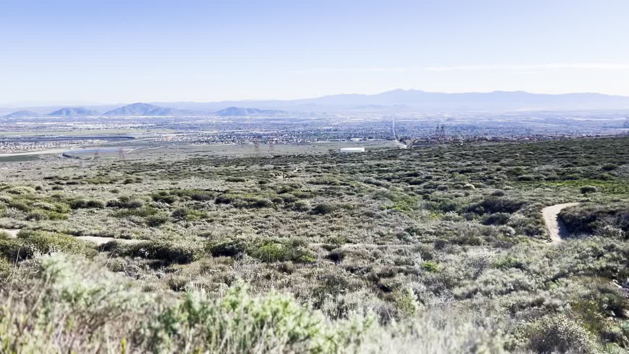 High desert at Angeles National Forest overlooking the valley with mountain ranges in the distance