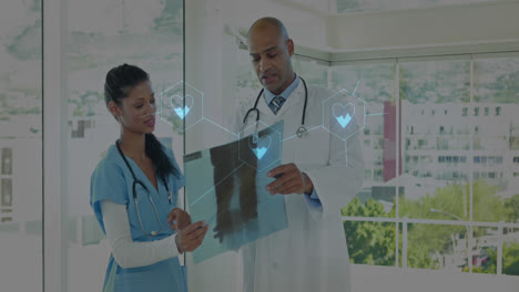 animation of medical icons over diverse doctors talking