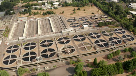 Circling-aerial-shot-over-American-waste-water-treatment-plant