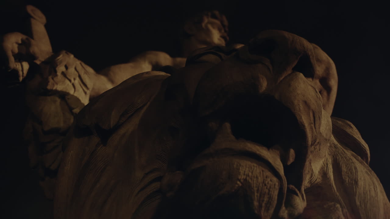Epic, ancient stone statue at night