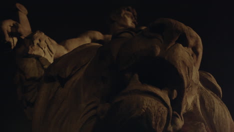 epic, ancient stone statue at night