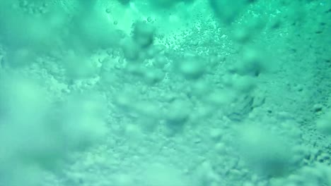 water bubbles from pool in slow motion.