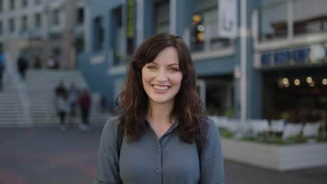 portrait-of-lovely-elegant-independent-woman-smiling-happy-cheerful-on-urban-sidewalk