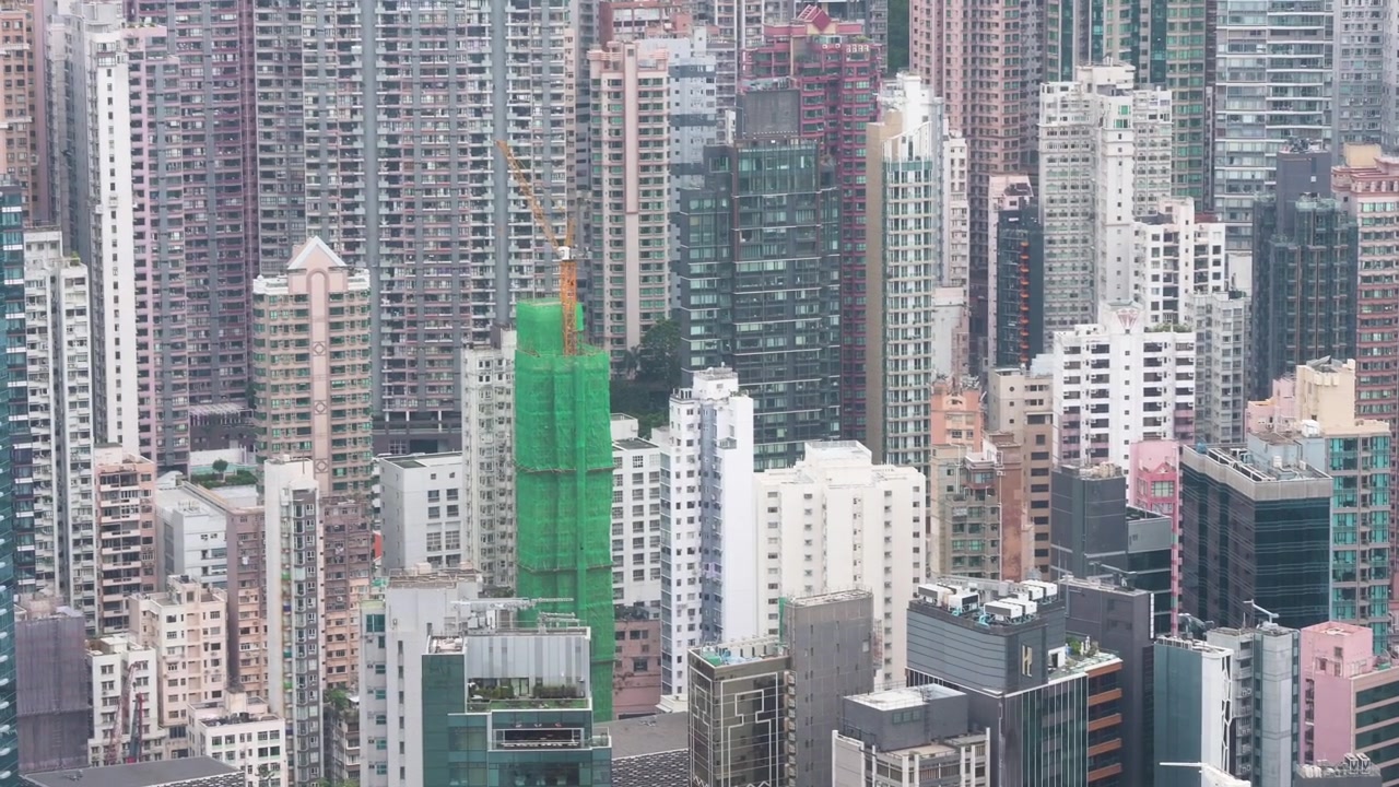 Vista aérea de apartamentos em arranha-céus e edifícios de escritórios em um dos locais mais densamente povoados do mundo