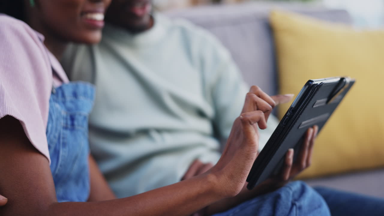 Hands, tablet and a happy black couple on the sofa