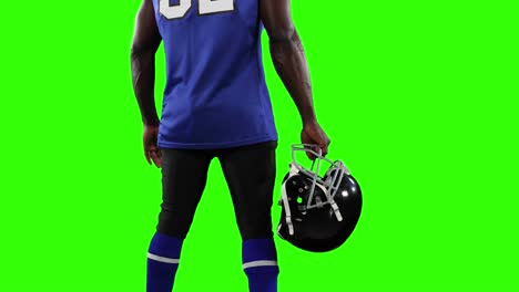 american football player on green screen background.