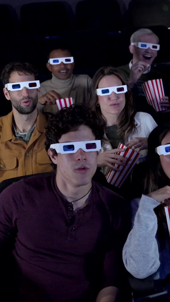 People watching a movie in 3D