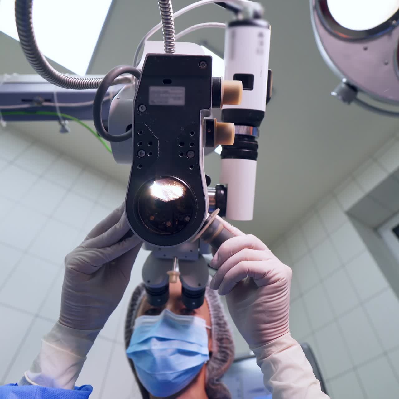 Surgeon operating patient