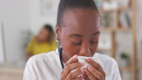 Woman,-tissue-and-blowing-nose-in-office-for-cold