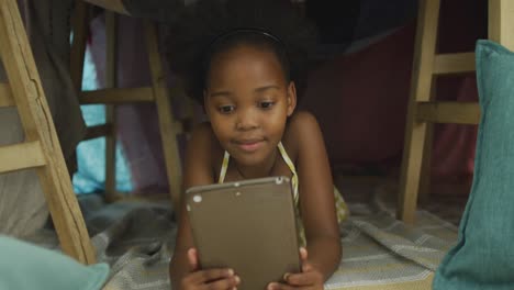 video of african american girl using tablet