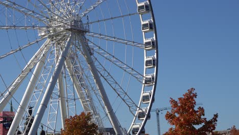 A-white-wheel-that-is-moving-peacefully-behind-a-city