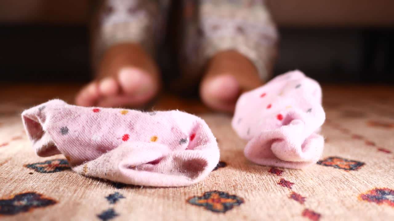 Dirty Pink Socks on the Floor