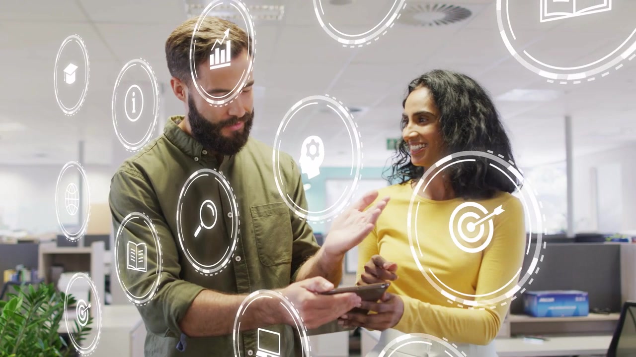 Man tapping smartphone and woman leaning in, showing floating UI icons and reviewing sales data