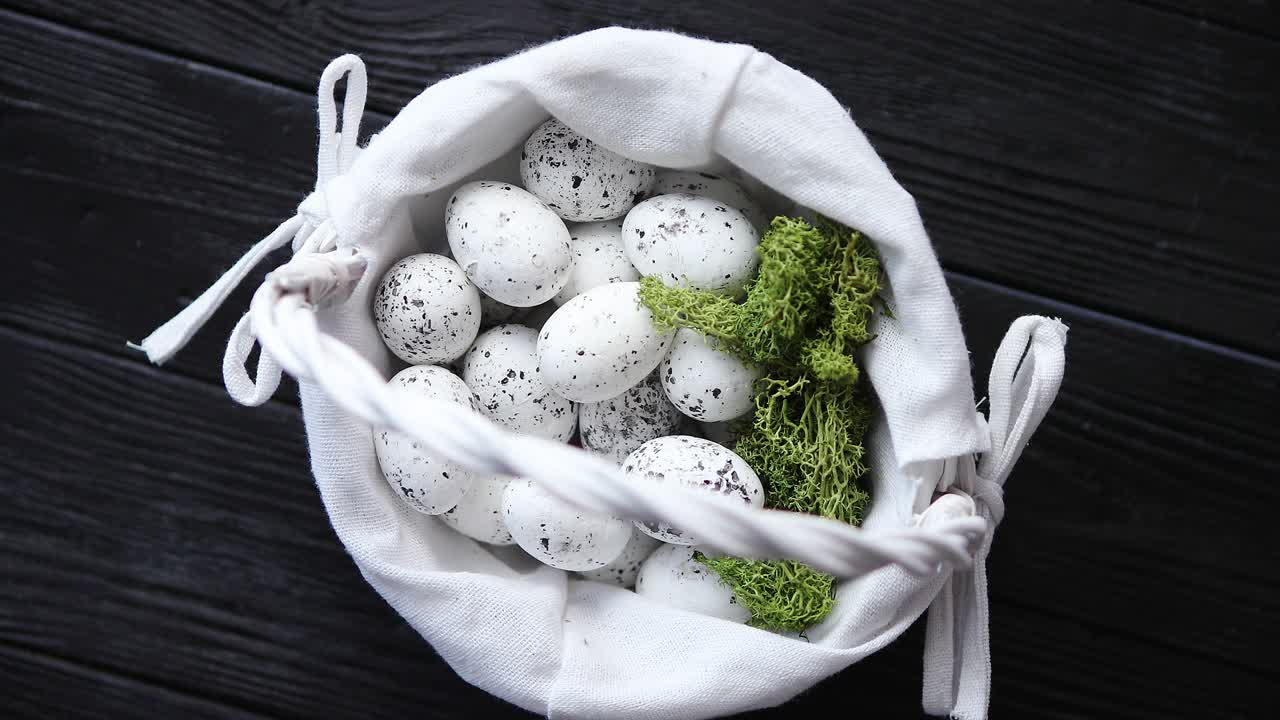 Quail Eggs In A Nest On A Black Rustic Wooden Background Easter Symbols