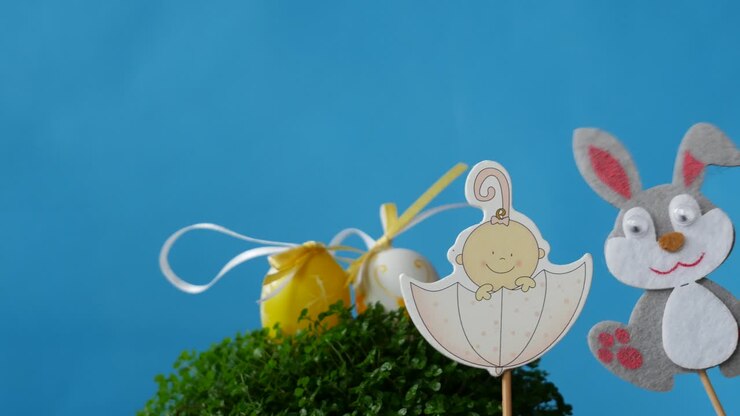 The Easter bunnies found Easter eggs and baby in umbrella.