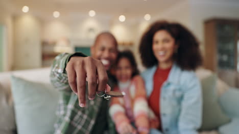 happy family with keys to new home
