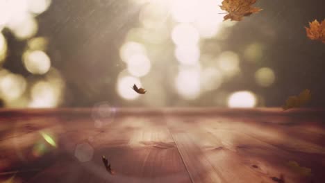 composite video of multiple autumn leaves falling over wooden surface against spots of light